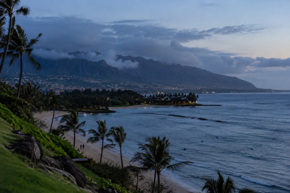Trade wind clouds crossing the Koʻolau mountain ridge above a windward Oahu valley