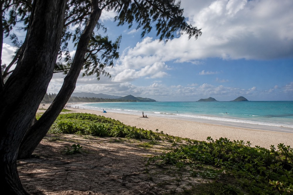 A wide view of Kailua Beach Park with turquoise water and a long strip of sand